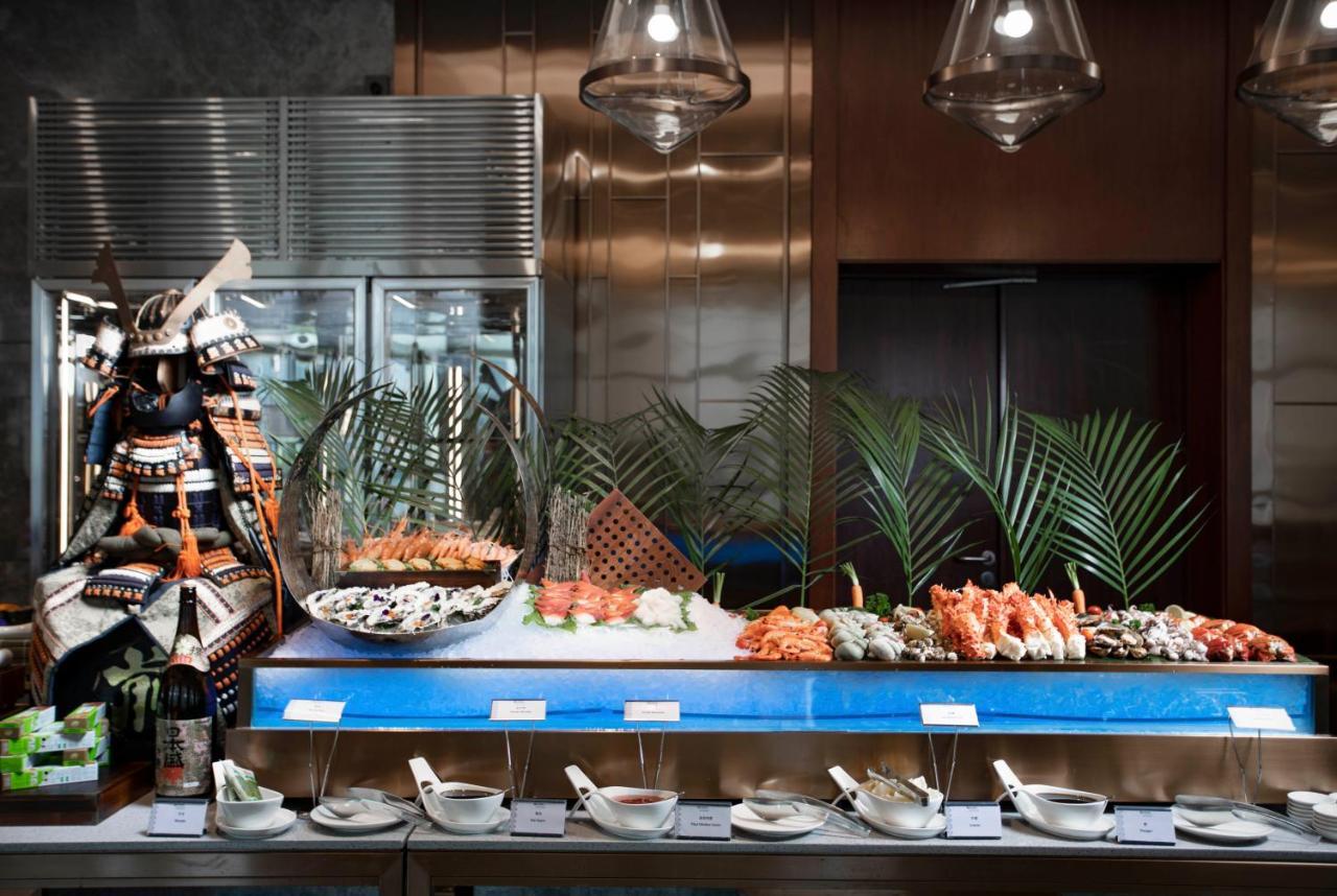 Kunming Huiyue Wyndham Hotel Bagian luar foto