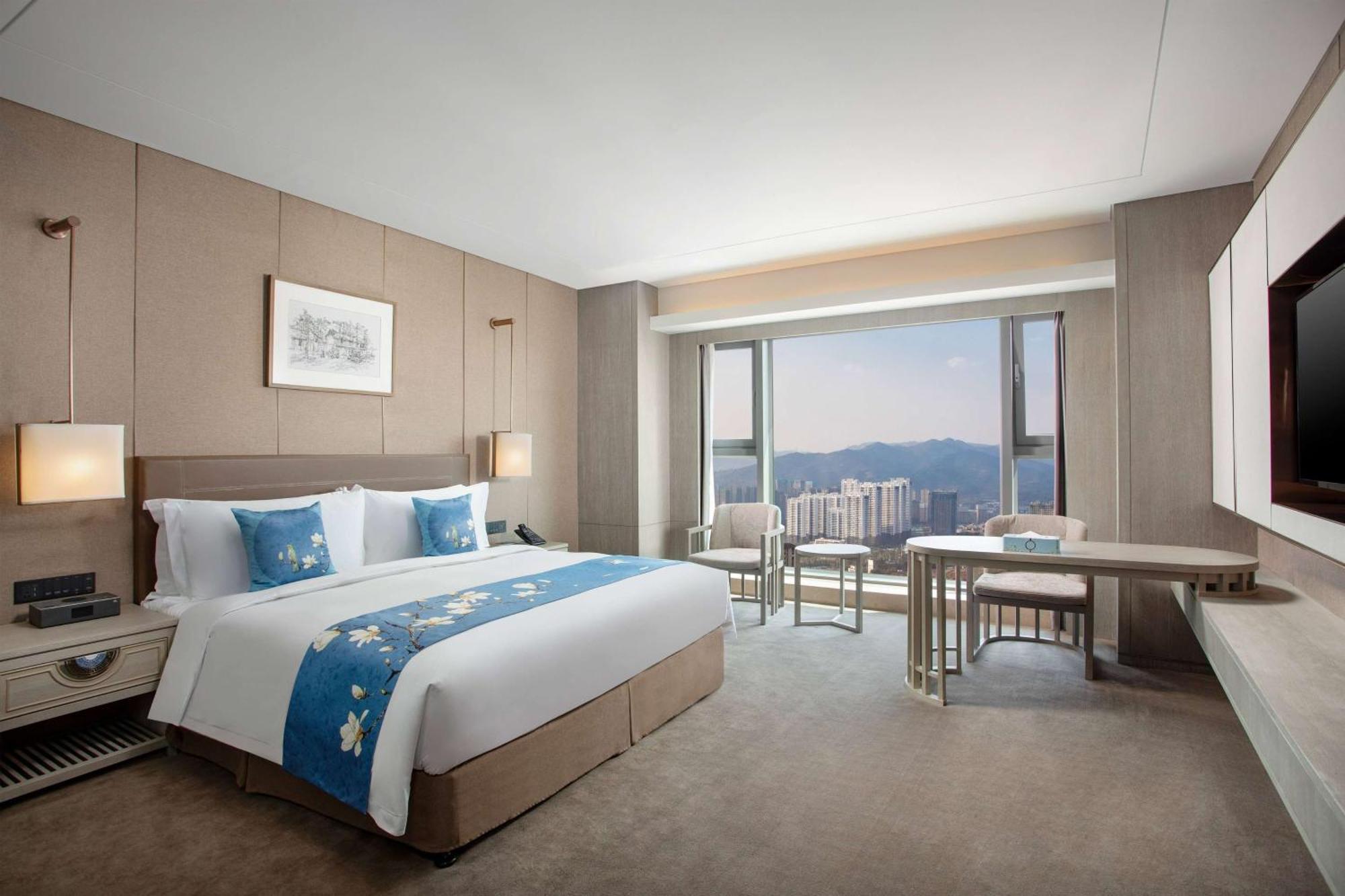 Kunming Huiyue Wyndham Hotel Bagian luar foto
