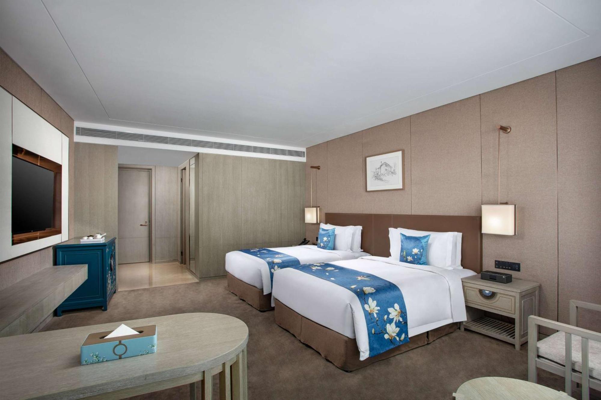 Kunming Huiyue Wyndham Hotel Bagian luar foto