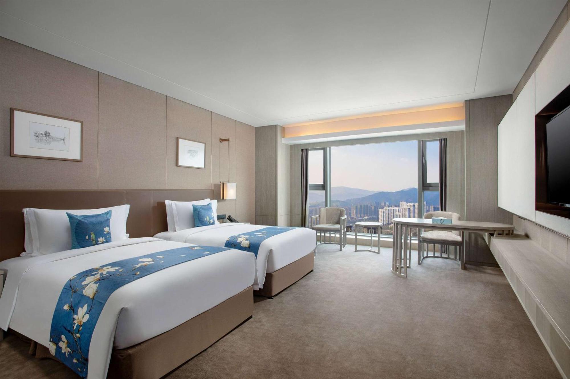 Kunming Huiyue Wyndham Hotel Bagian luar foto
