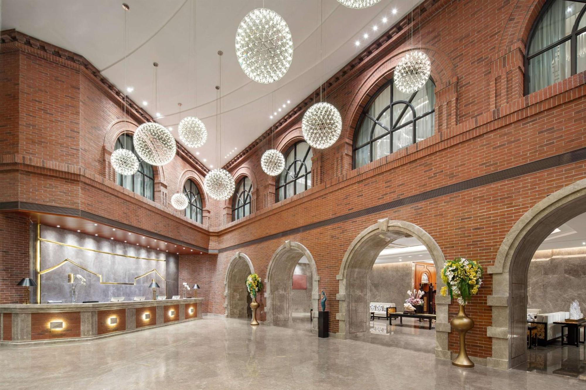 Kunming Huiyue Wyndham Hotel Bagian luar foto
