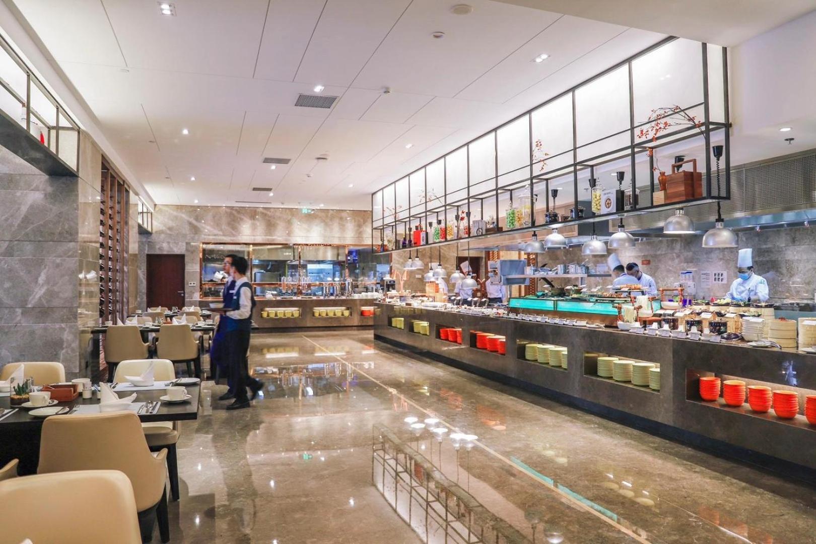Kunming Huiyue Wyndham Hotel Bagian luar foto
