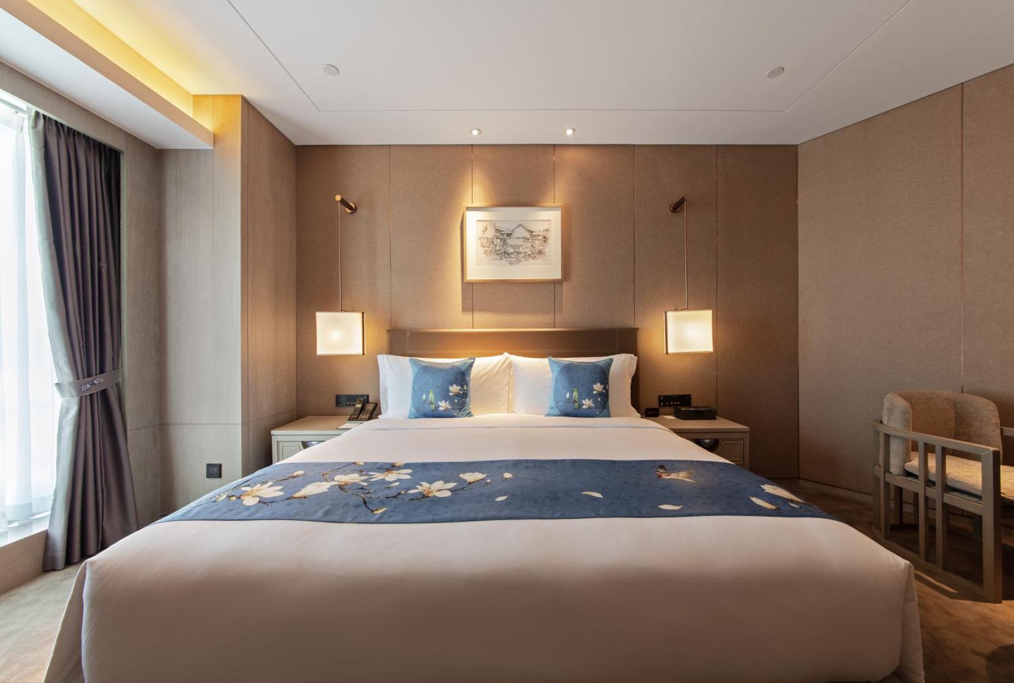 Kunming Huiyue Wyndham Hotel Bagian luar foto