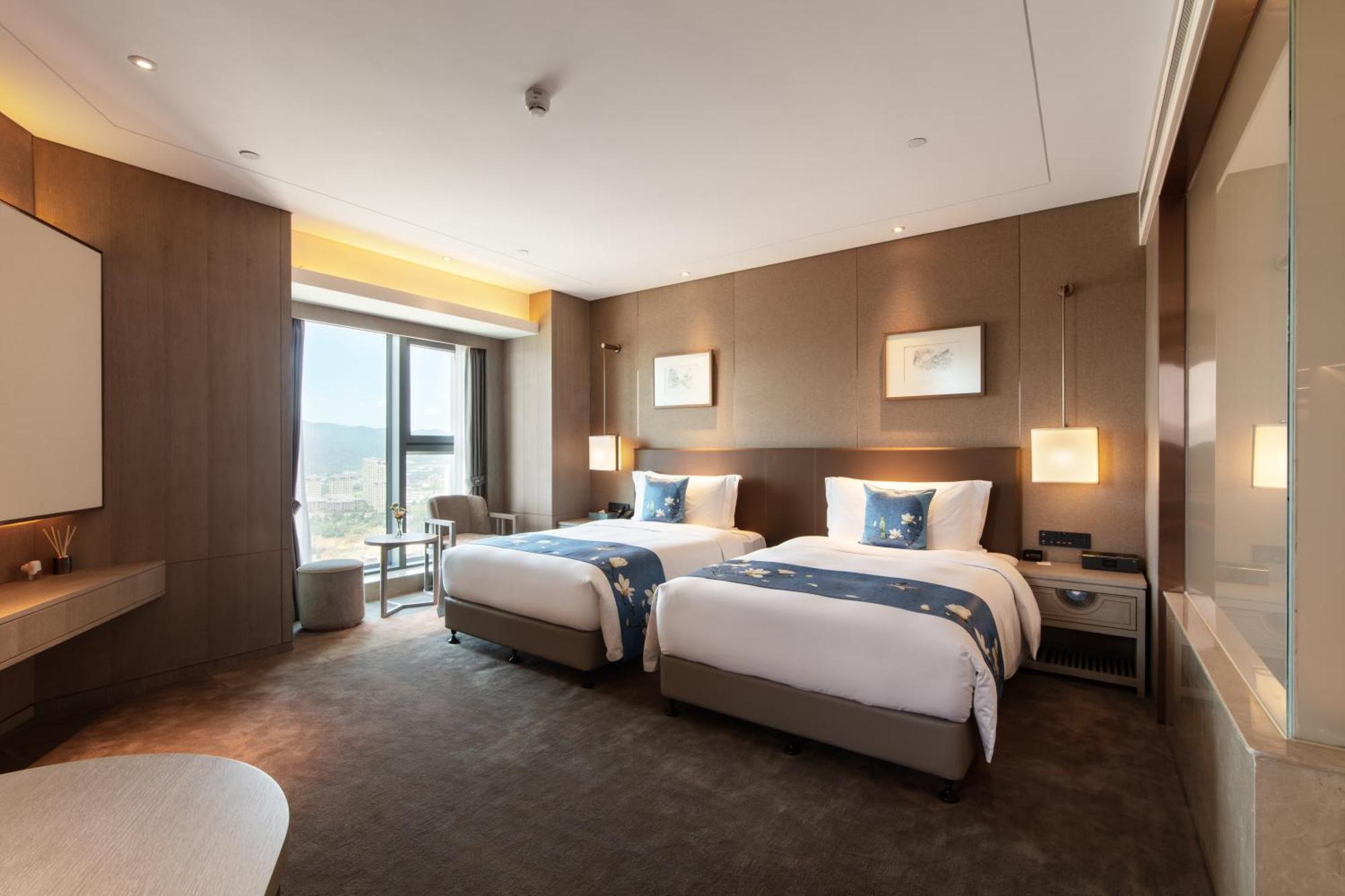 Kunming Huiyue Wyndham Hotel Bagian luar foto